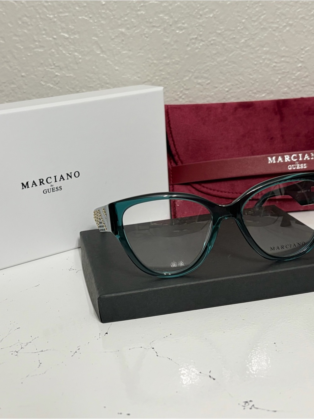 Marciano Teal Cat Eye Sunglasses with Gold-Accent Temples.